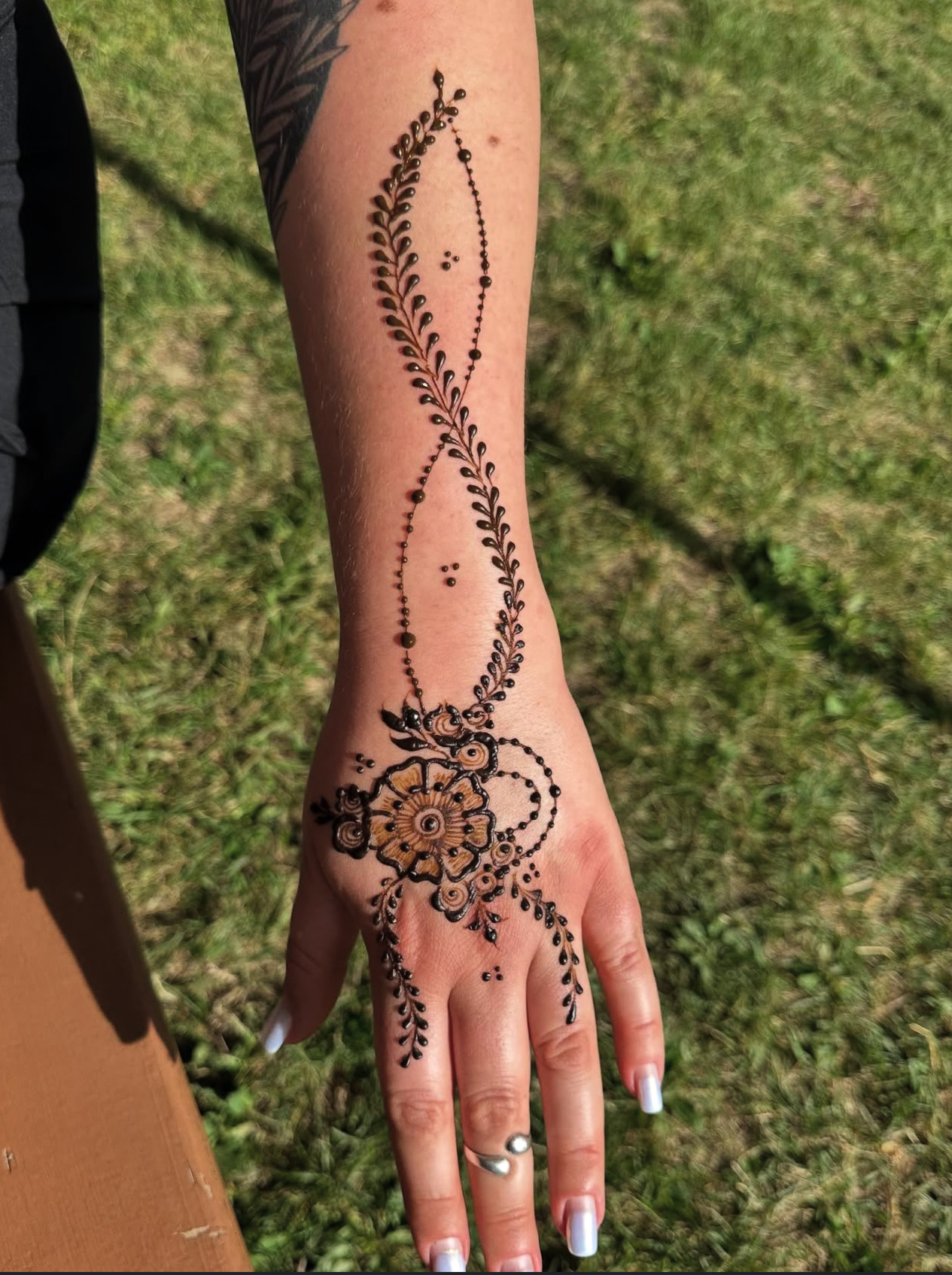 Floral vine henna arm design Edmonton